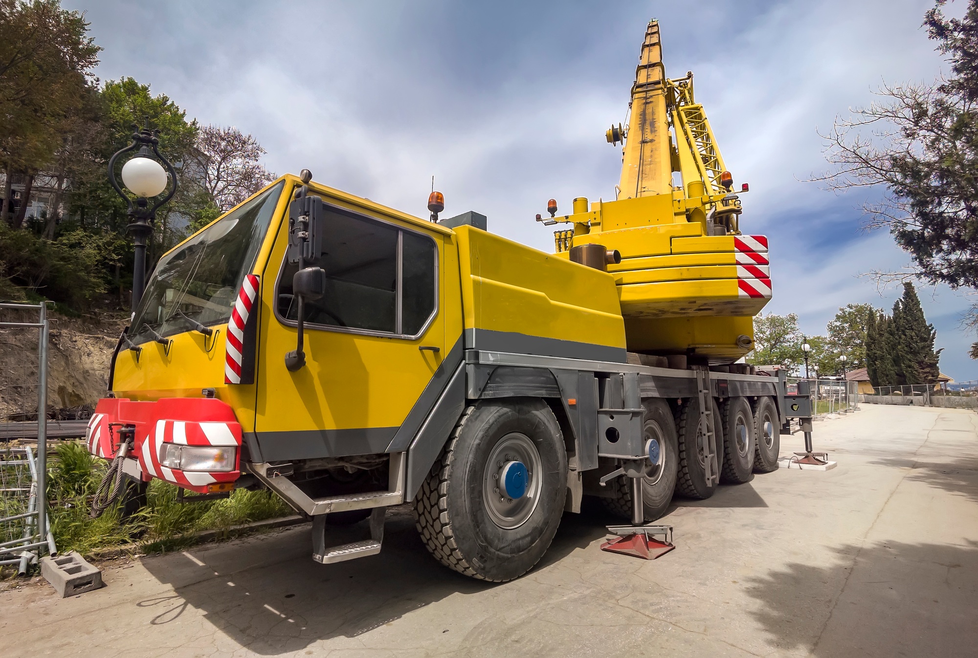 Mobile crane at construction site heavy truck big